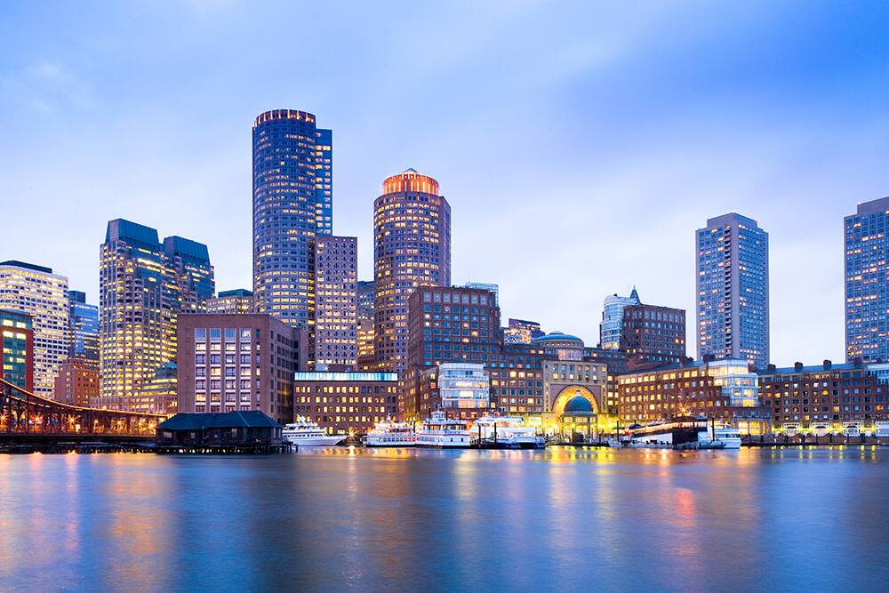 Boston skyline and harbor at night