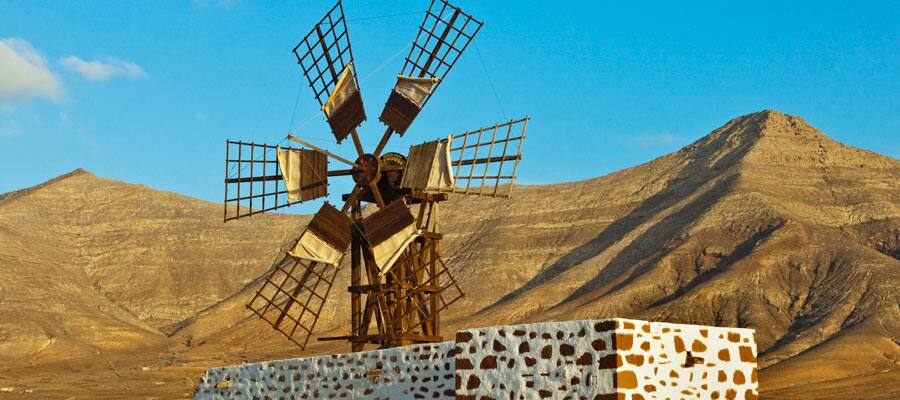 Journey among dramatic mountainous and desert landscapes.