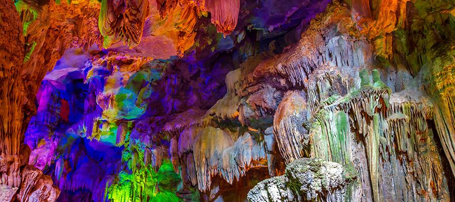 Colorful caves on your Cruise to Hanoi (Ha Long Bay)