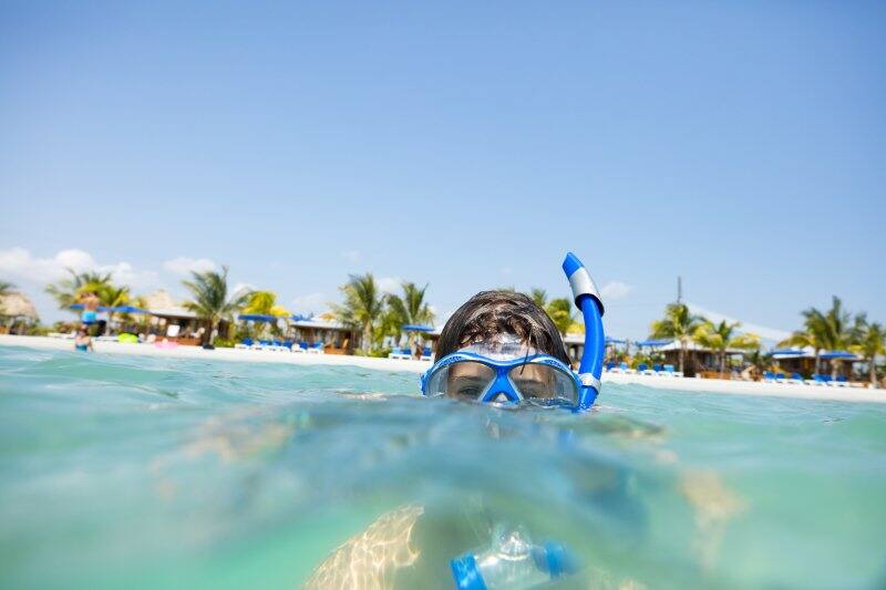 Swim and Play on the Beach in Harvest Caye